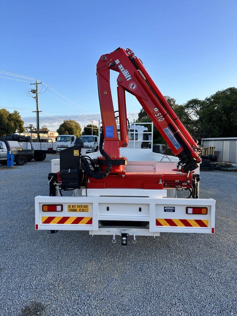 Crane installed on back of truck.