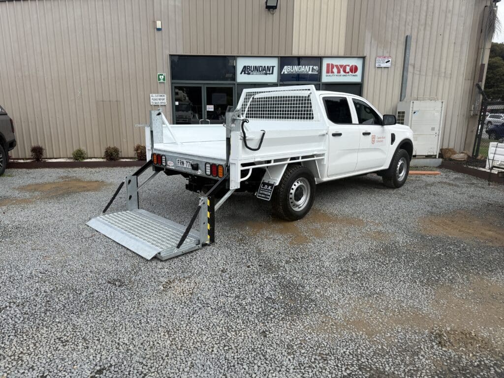 Tommy Gate installed on ute; opened.