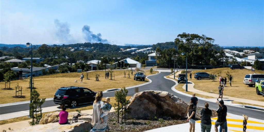 Australia suburban area. People and cars.
