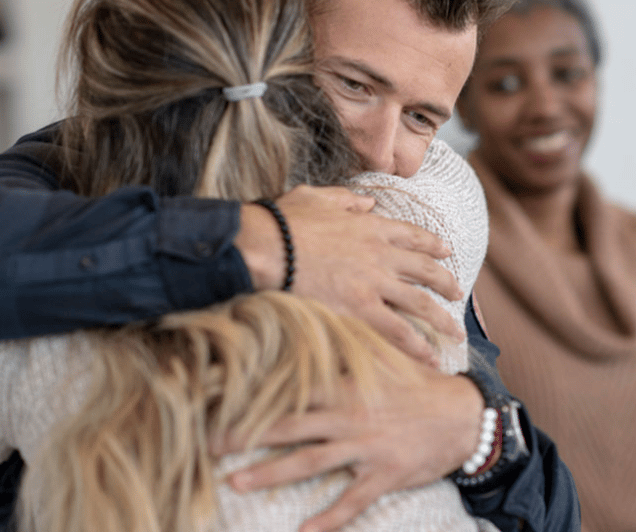 People hugging.