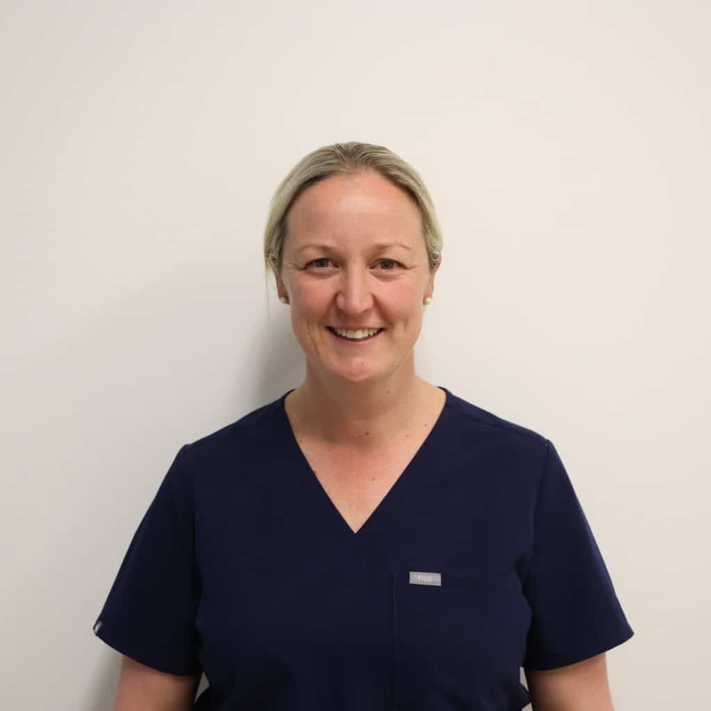 Female veterinarian in navy scrubs Wagga Wagga hospital